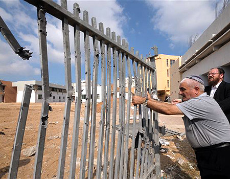 Damage to yeshiva building (Photo: Avi Rokach)